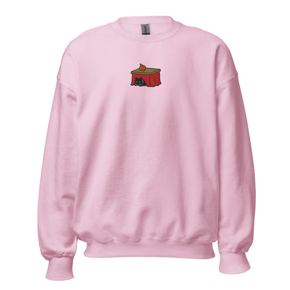 Light pink crewneck sweatshirt with the embroidered Kotatsu Cat design, front view